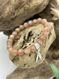 Bracelet pierre de soleil plume