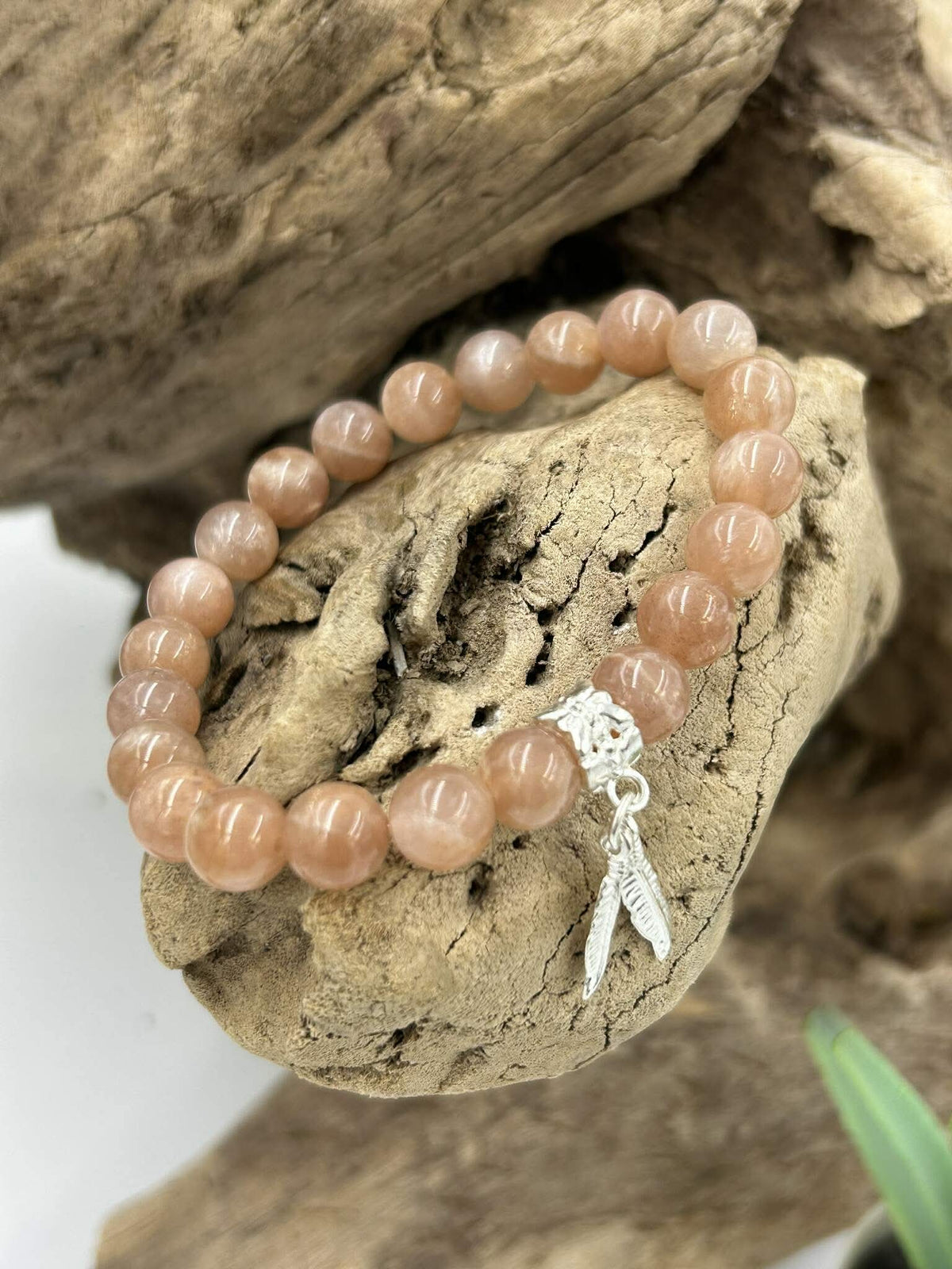 Bracelet pierre de soleil plume