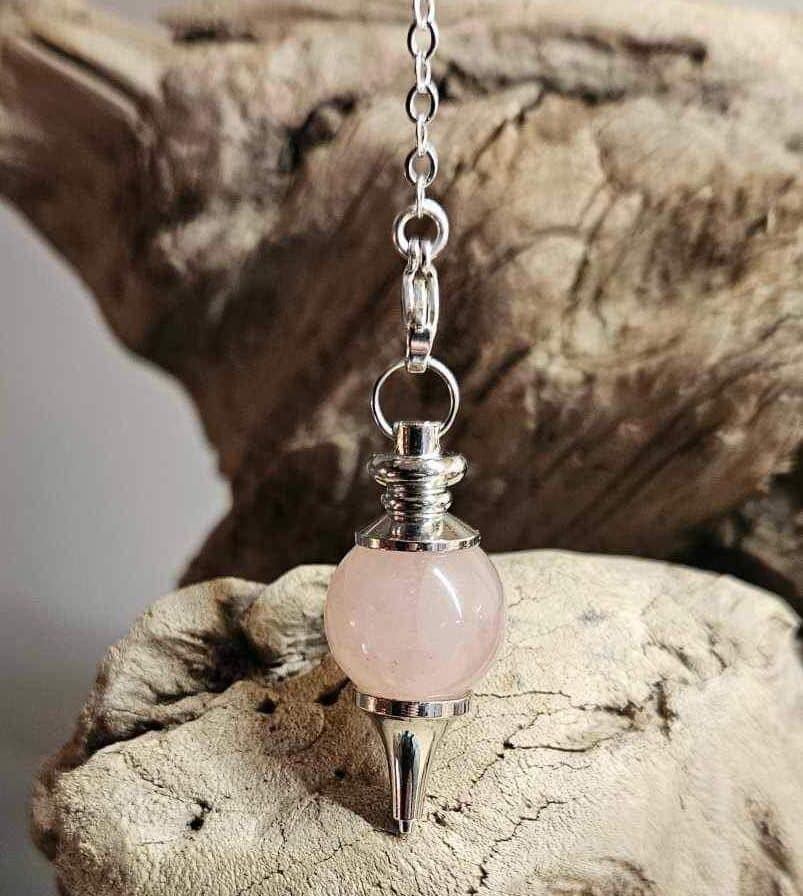 Pendule Quartz rose sphère