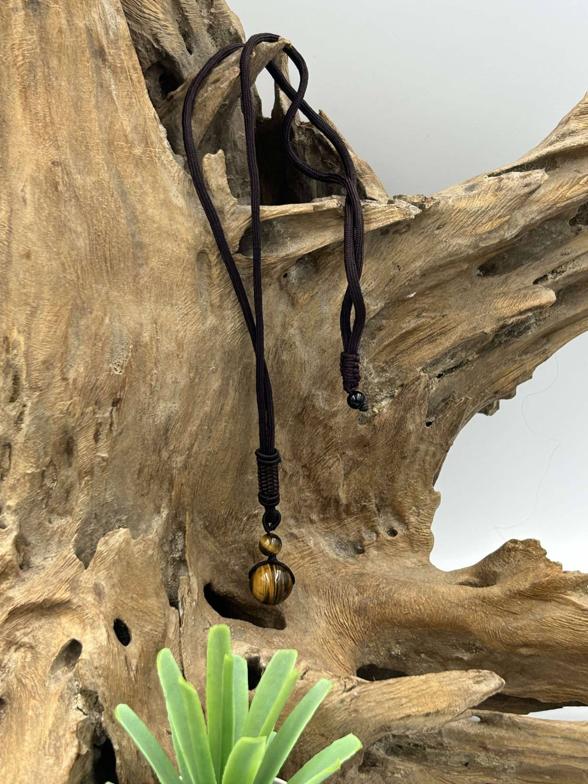 Collier boule en œil de tigre
